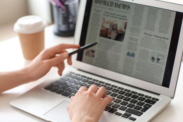 Person reading online journal