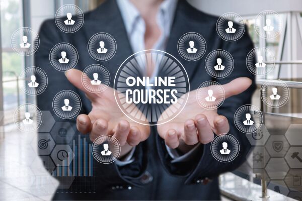 Online courses text in a white circle linked to multiple people icons, with a blurred human image in the background